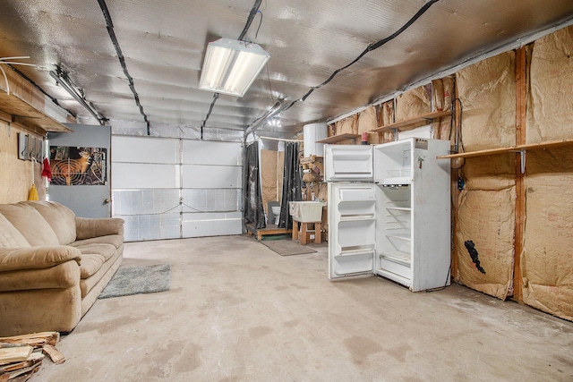 garage with white fridge