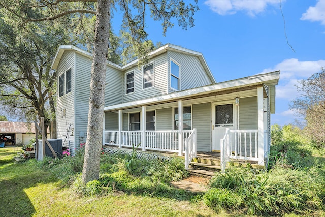 view of front of property featuring covered porch