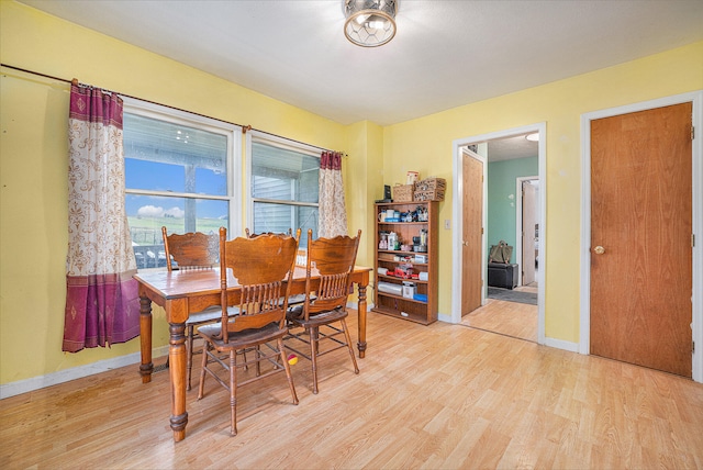 dining room featuring light hardwood / wood-style flooring