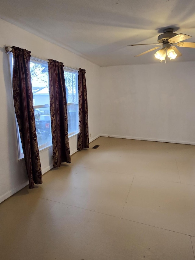 spare room featuring ceiling fan