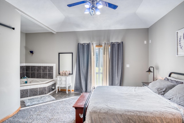 bedroom with carpet flooring, vaulted ceiling, and ceiling fan