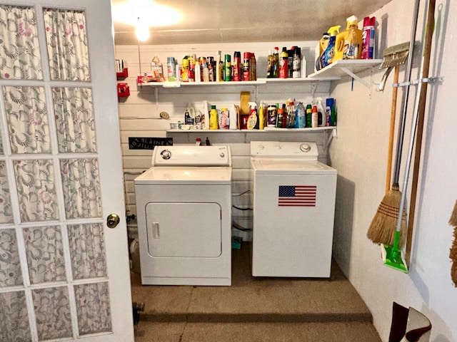 laundry area with washing machine and clothes dryer