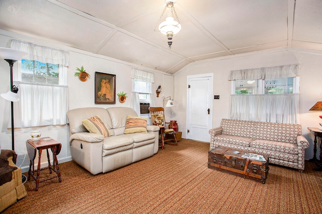 living room featuring a wealth of natural light and lofted ceiling