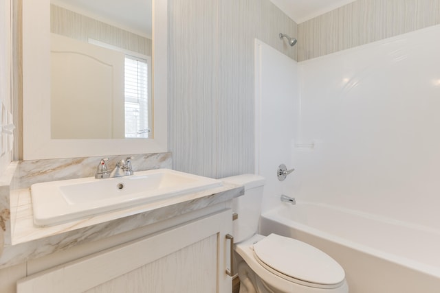 full bathroom with vanity,  shower combination, and toilet