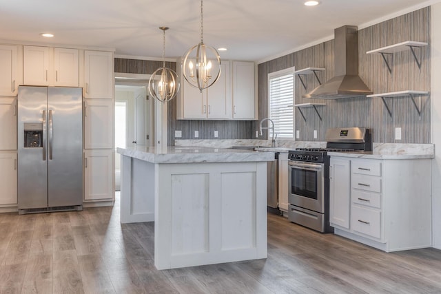 645 N Gallery Dr Unit 98, Eaton Rapids, MI 48827 - kitchen featuring stainless steel appliances, open shelves, wall chimney exhaust hood, a chandelier, and a center island