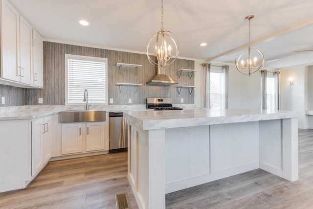 645 N Gallery Dr Unit 98, Eaton Rapids, MI 48827 - kitchen featuring a chandelier, open shelves, a sink, stainless steel appliances, and decorative backsplash