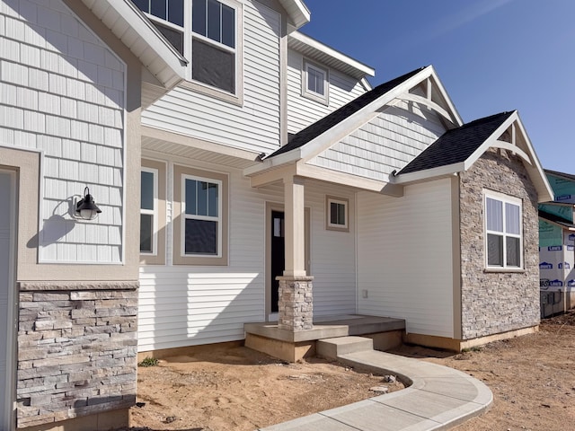 view of front of property featuring stone siding