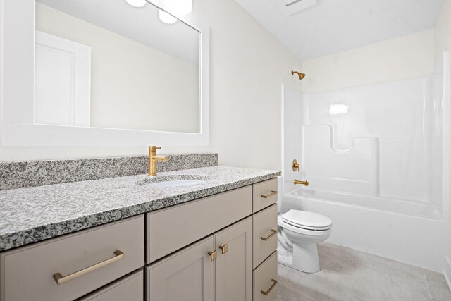 full bath with toilet, vanity, washtub / shower combination, and tile patterned floors