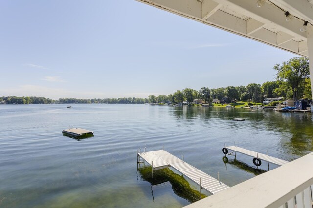 976 Doster Rd, Plainwell, MI 49080 - dock area featuring a water view