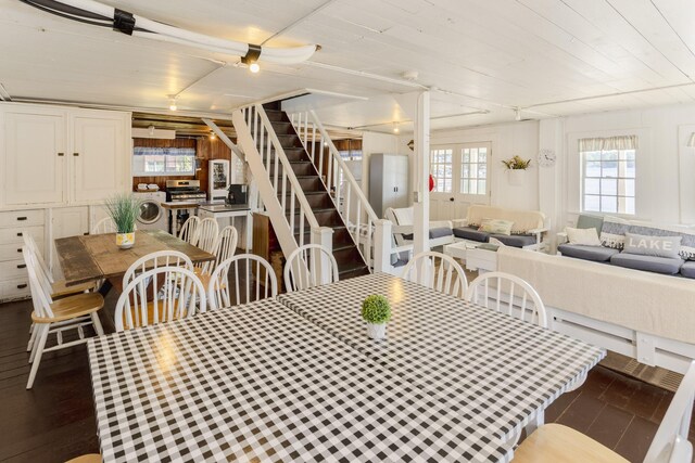976 Doster Rd, Plainwell, MI 49080 - dining room featuring stairway and washer / dryer