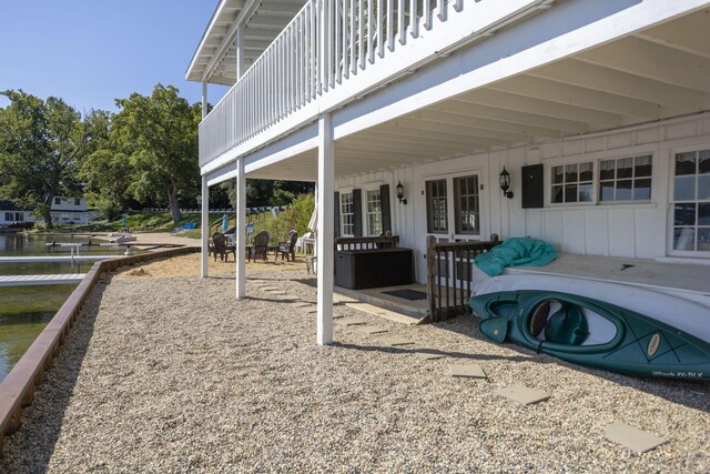 976 Doster Rd, Plainwell, MI 49080 - view of patio / terrace with a water view and a balcony