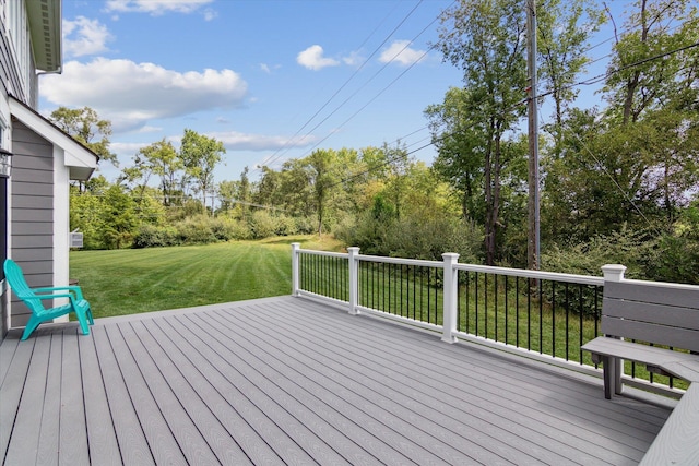 deck featuring a yard