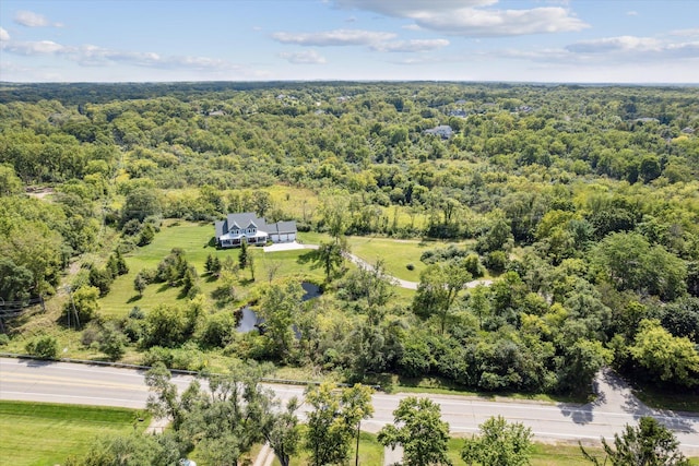 aerial view featuring a view of trees