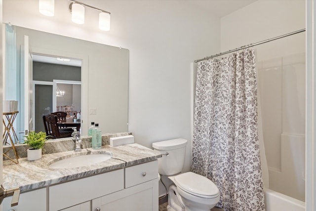 full bathroom with vanity, toilet, and shower / bathtub combination with curtain