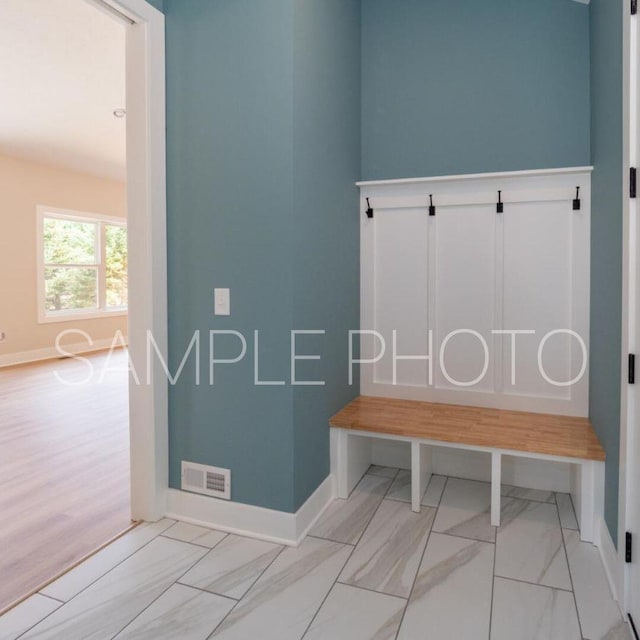 mudroom featuring light hardwood / wood-style floors