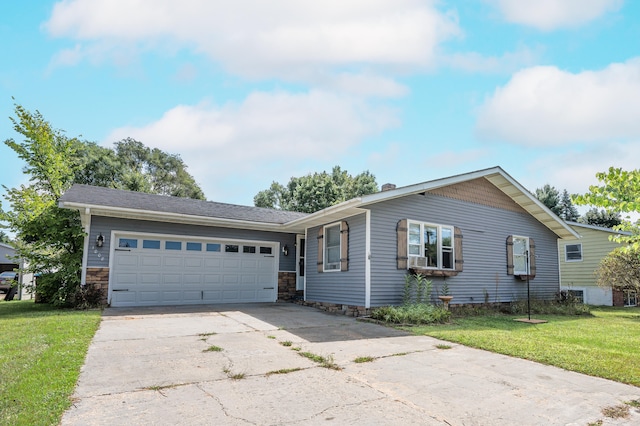 ranch-style house with a garage and a front yard