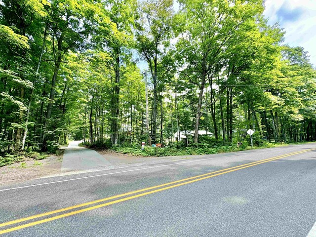2144 N Jacobson Rd, Suttons Bay, MI 49682 - exterior space with an outbuilding and gravel driveway