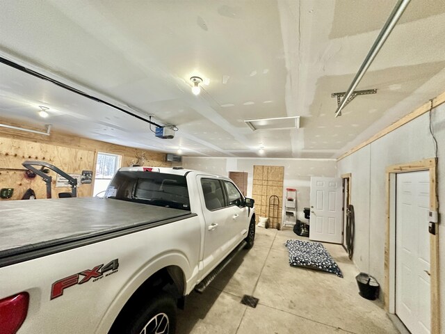 2144 N Jacobson Rd, Suttons Bay, MI 49682 - garage featuring wood walls