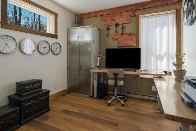 2144 N Jacobson Rd, Suttons Bay, MI 49682 - home office with wood finished floors and baseboards