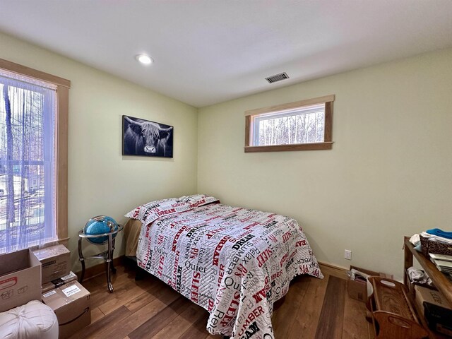 2144 N Jacobson Rd, Suttons Bay, MI 49682 - bedroom with wood finished floors, recessed lighting, and baseboards