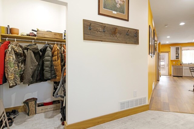 2144 N Jacobson Rd, Suttons Bay, MI 49682 - hallway with recessed lighting and light wood-style flooring