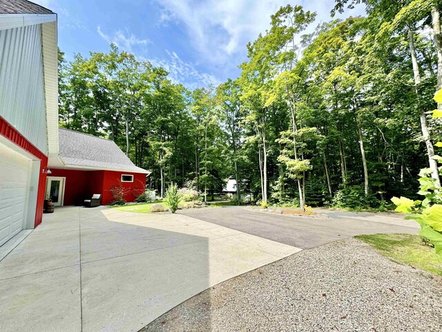 2144 N Jacobson Rd, Suttons Bay, MI 49682 - view of yard with concrete driveway