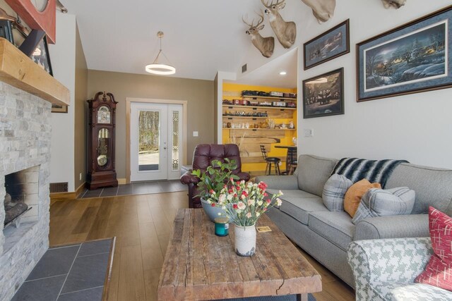 2144 N Jacobson Rd, Suttons Bay, MI 49682 - living area with wood finished floors and a fireplace