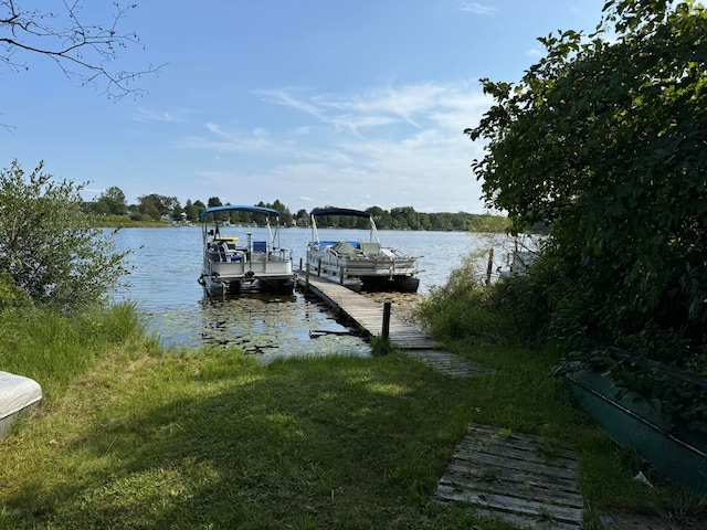 dock area featuring a water view