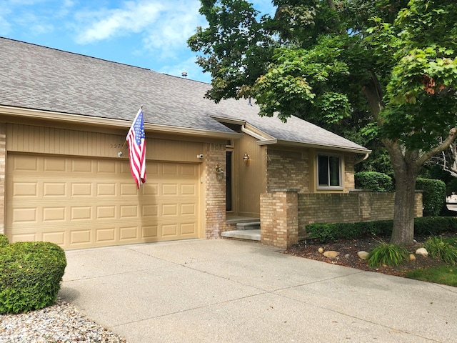 single story home featuring a garage