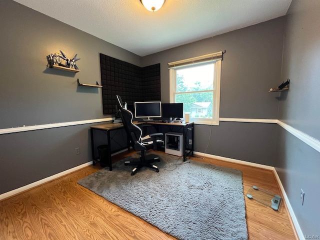 office area with hardwood / wood-style floors