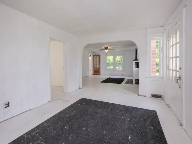 interior space featuring ceiling fan