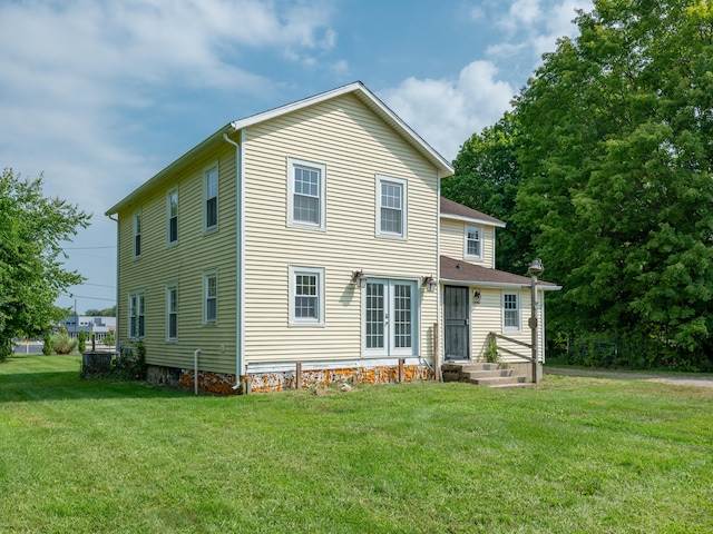 view of front of home featuring a front yard