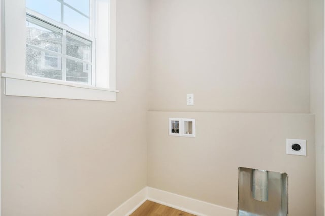 clothes washing area with washer hookup, wood-type flooring, and electric dryer hookup