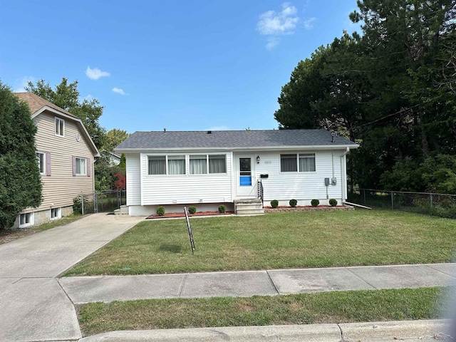 view of front of property with a front lawn