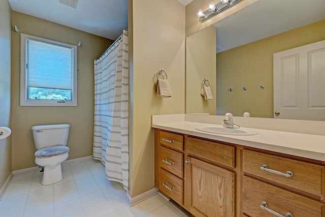 bathroom featuring tile patterned flooring, vanity, toilet, and a shower with shower curtain