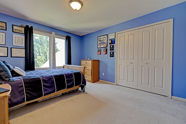 bedroom featuring a closet and carpet