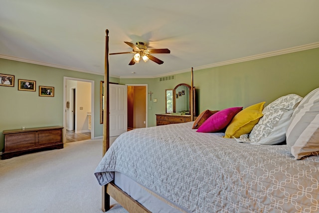 bedroom featuring carpet flooring, ceiling fan, and crown molding