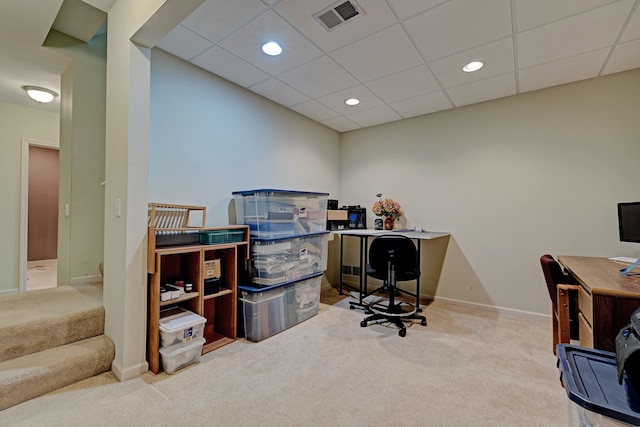 office space with light carpet and a drop ceiling