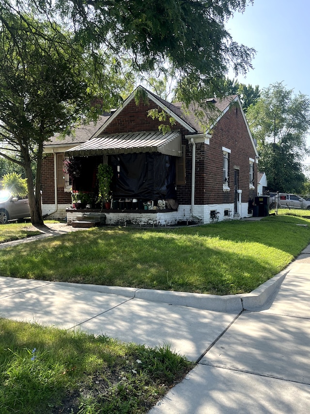 view of property exterior featuring a yard