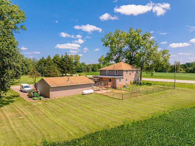 view of yard with a rural view