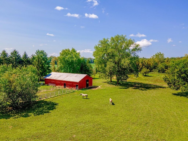 2370 S M-140, Eau Claire, MI 49111 - view of yard with an outbuilding, an outdoor structure, a garage, driveway, and a view of rural / pastoral area