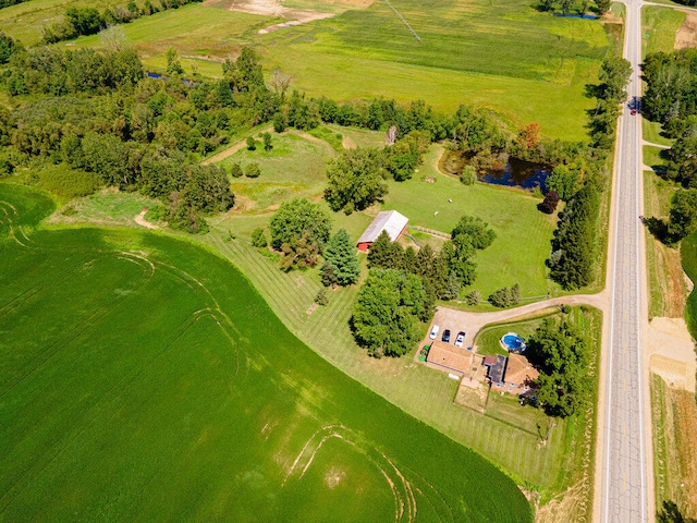 birds eye view of property featuring a rural view