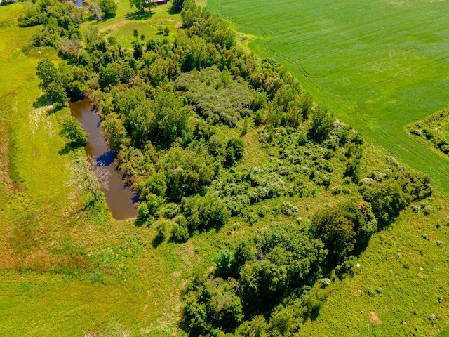 aerial view featuring a rural view and a water view