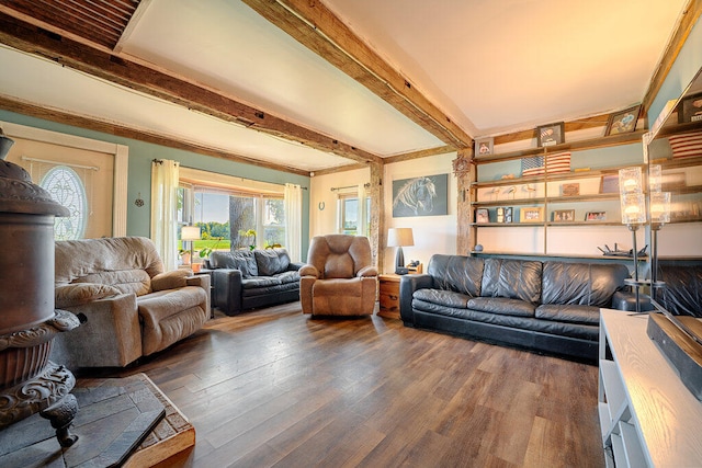 living room featuring beam ceiling and dark wood-type flooring