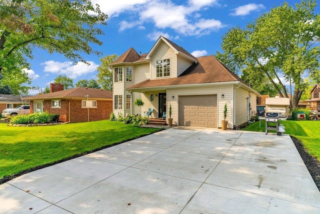 view of front facade with a garage and a front lawn