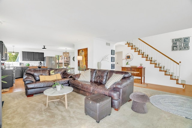 living room featuring ornamental molding