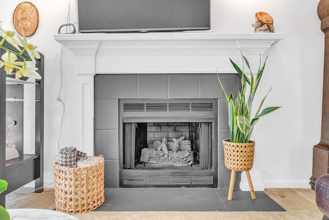 room details with a tiled fireplace