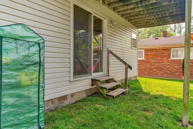 exterior space featuring a lawn