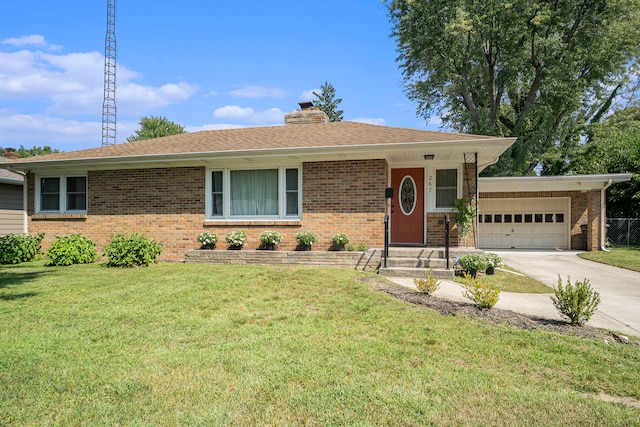 ranch-style home with a garage and a front lawn