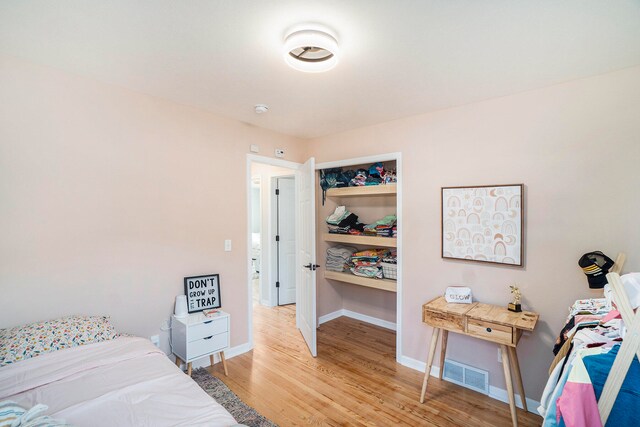 bedroom featuring hardwood / wood-style flooring